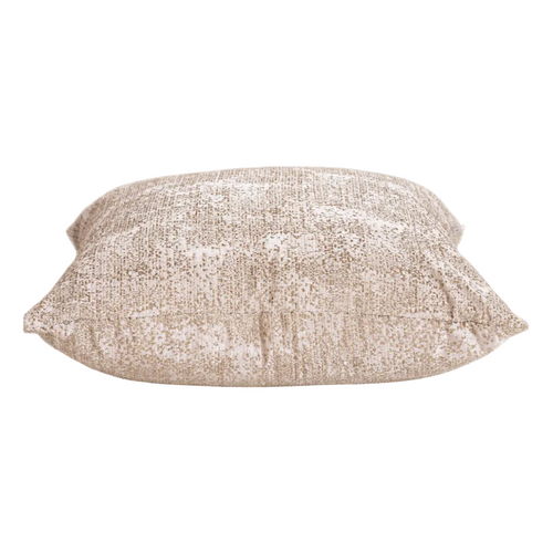Textured beige pillow on a white background